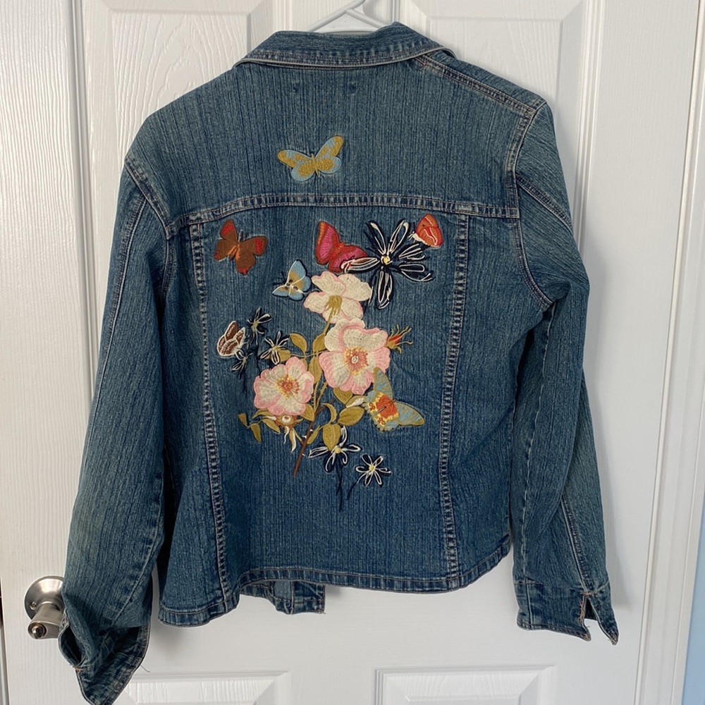 Cabi denim jacket with embroidered floral design on back, size small
